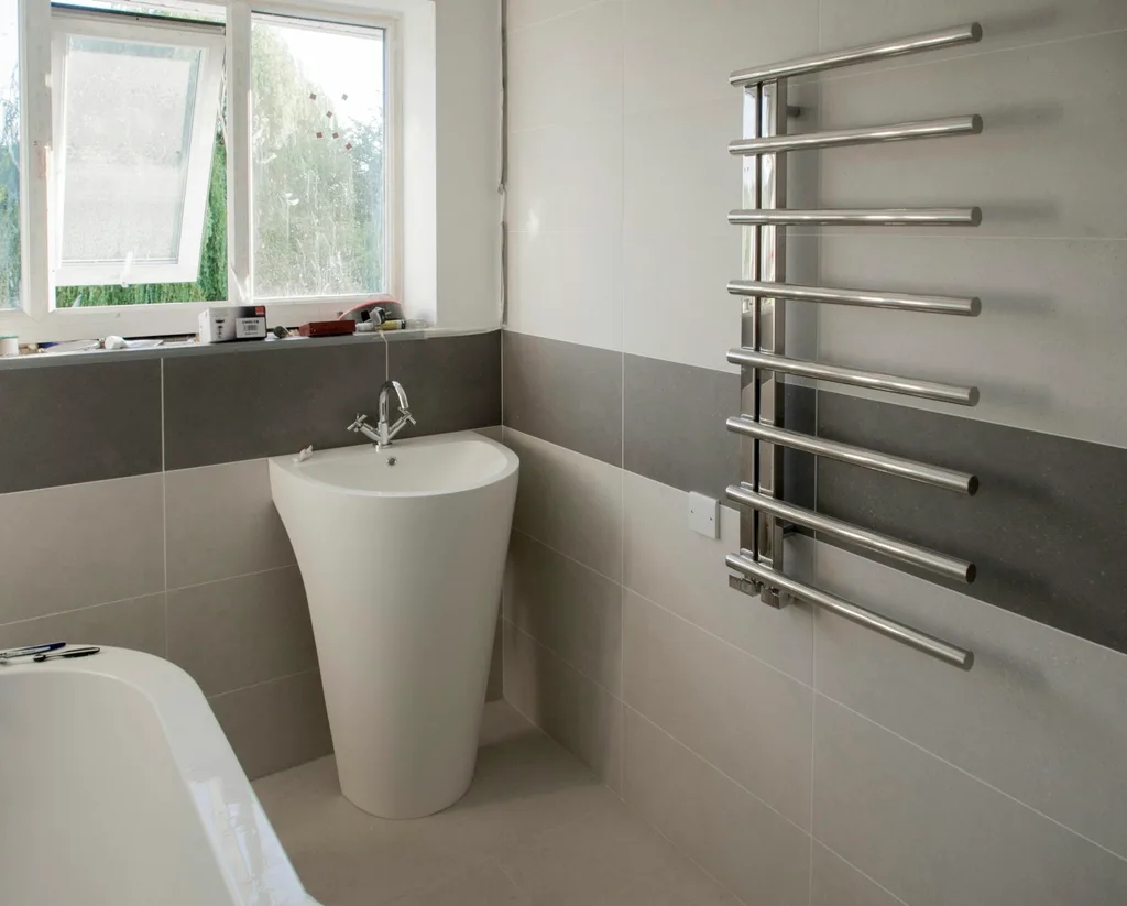Modern bathroom plumbing installation — service imagery